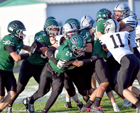 The H&H Bearcat defense pitched a shutout in its first-ever 11-man football game, downing Schuyler 43-0. 