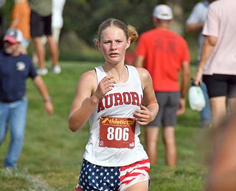 Kailey Dick ran her first race of the season at the Aurora Invite with renewed strength an a finish of 18th with a time of 22:36. Aurora runners wore American Flag shorts in celebration of America 250 and in remembrance for the 25th anniversary of 9/11.