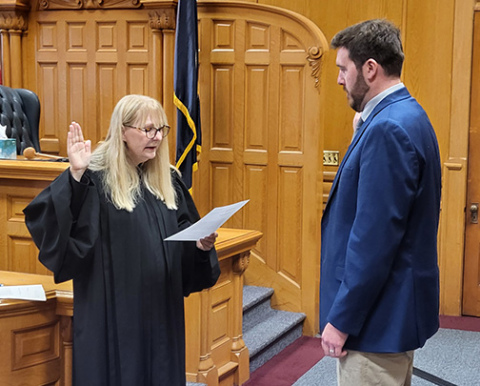 New Hamilton County Attorney Nathan Heinz of York is sworn in Thursday morning by District Judge Rachael Daughterty. In remarks after the swearing in, the judge noted that Heinz’s first hearing as a defense attorney had taken place before her in that very same courtroom. 