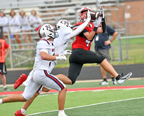 Aurora senior Kash Kleinschmidt hauled in two touchdown catches as the Huskies downed Norris 30-21 Saturday afternoon. The game was postponed from Friday night to Saturday afternoon after rain and lightning continued throughout the night hours Friday. 