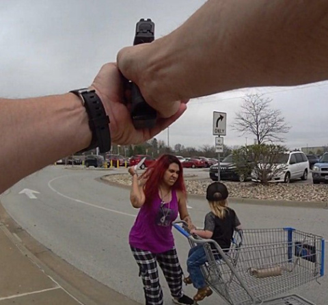 A police officer’s body cam captured this image just before the woman in the picture was shot and killed in an Omaha Walmart parking lot after she kidnapped and assaulted a child with a knife. The incident prompted Douglas County Sheriff Aaron Hanson to call for changes in the laws dealing with mentally ill individuals due to the fact that the woman in question had recently been found not responsible by reason of insanity in a previous assault and vandalism. 