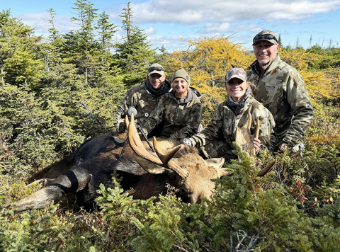 Pictured with one of three bull moose taken on a 2024 hunting trip to Newfoundland are, from left: Cory, Tracy, Megan and Clint Ohlson, all of Aurora.