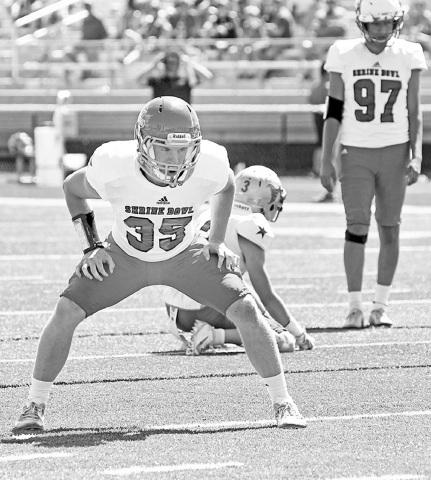 High Plains grad Keaton Van Housen lines up in the field goal formation during Saturday’s Shrine Bowl game. News-Register/Richard Rhoden