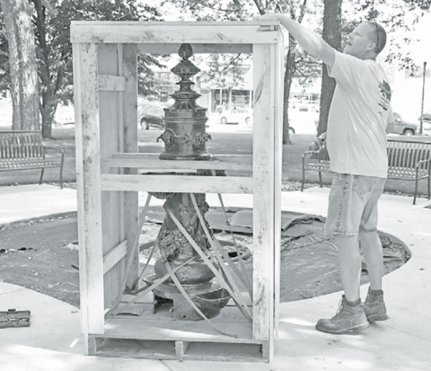 Historic fountain returns home