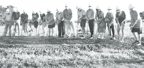Members of the Aurora United Methodist Church broke ground Sunday on a $2.2 million expansion project, which will include four new classrooms, a new kitchen, large activity space, storage and other amenities. News-Register/Kurt Johnson