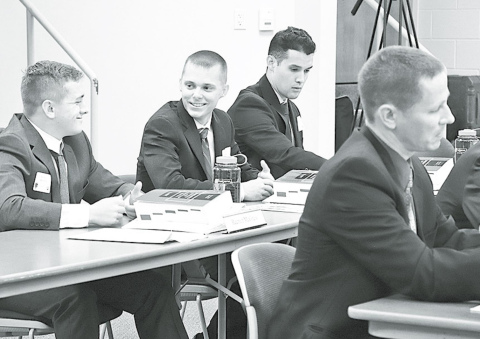 Aurora native Grant Moody, pictured back center, sits with the other recruits in the State Patrol’s 63rd Basic Recruit Camp. Courtesy photo