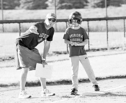 Little leaguers bask in the summer heat