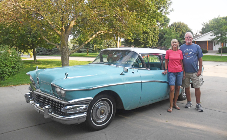 Sue and Wayne Deininger stand by the 1958 Buick Special which Sue was given by her parents and drove years ago while in high school.