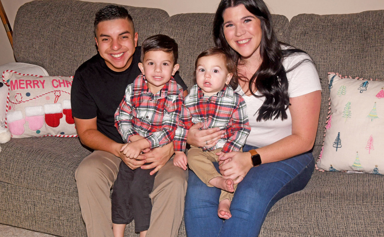 Jaydon Stuart launched Birth & Beyond in November, offering doula services to expecting moms in Hamilton County and beyond. She is shown here with her partner Alex and sons Madden and Wesley.