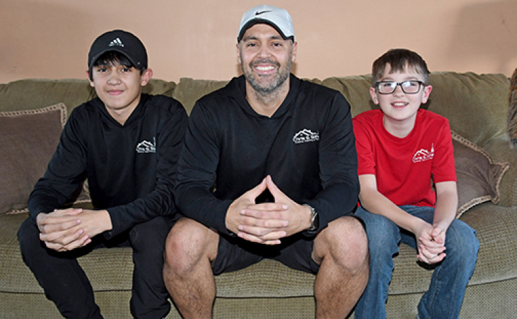 Christopher Cabello, shown here with son Zandon Cabello, left, and Kyler White, launched Chris & Sons Exterior Painting & More last October and is excited to offer painting, window and gutter cleaning services to Hamilton County and beyond.