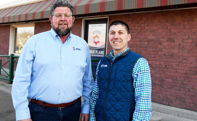 Founder and executive director Mick Anderson, left, and safety specialist Mark Dunn stand outside the new headquarters of Great Plains Safety and Health Organization, now located at 1312 L St. in Aurora.