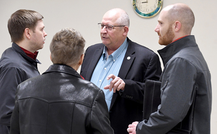 Dist. 34 Sen. Curt Friesen visits with constituents after Friday’s town hall forum in Aurora, including, from left: Jim Ediger, Cyndi Muilenburg and Brock Wyatt.