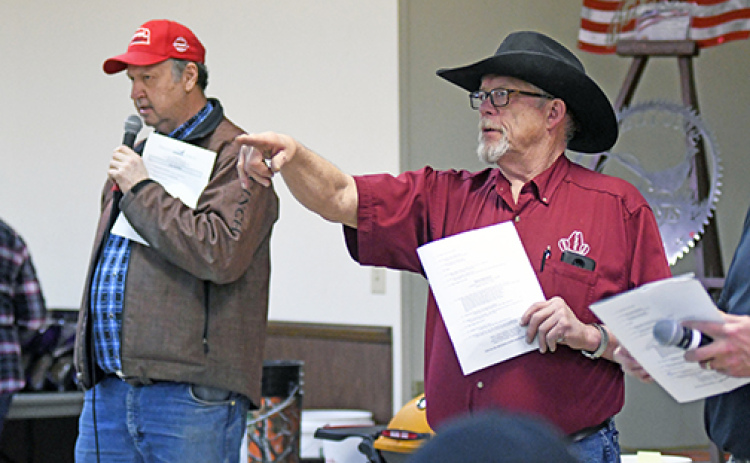 Tom Cornwell (left) and Kelly Kliewer can be seen in action at the Pheasants Forever Banquet in 2019. This is one of the many live events that both companies have helped auctioneer for over the years, though there is a growing trend for auctions shifting to an online format.