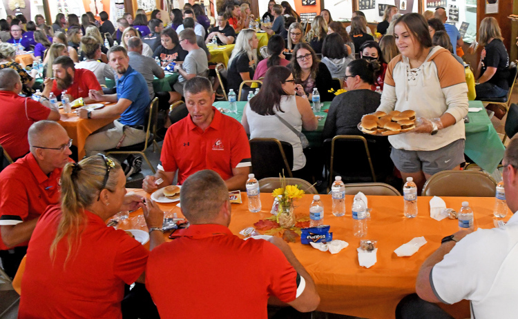 Staff members from Aurora, Giltner, Hampton and Hampton Lutheran gathered for a luncheon Monday afternoon where they were served by a group of students from the four schools.