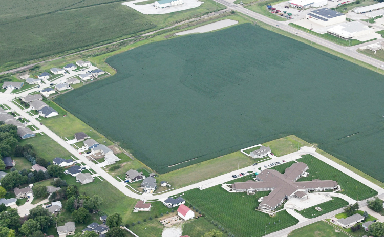 This aerial view of the Streeter Subdivision in Aurora shows where 60 housing lots have been platted in an area now covered with soybeans. Streeter third and fourth additions are located toward the center portion of the photo, between Westfield Quality Care at far right and the 10-unit Streeter Second Subdivision at far left.