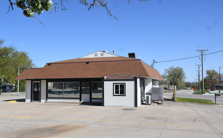 The former Chuck’s 2.0 Restaurant building at 850 Q St. in Aurora is closed now and the property is available for sale.