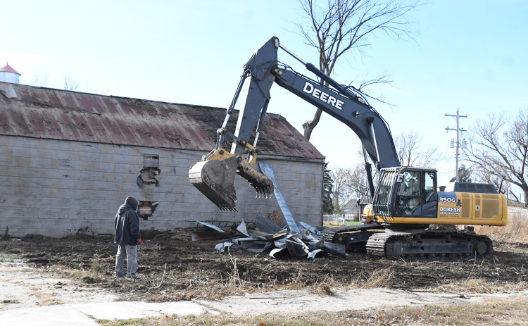 A demolition crew cleared this lot, then tore down the building pictured next to it, making way for a new bar and grill expected to open on Main Street in Phillips by next spring.