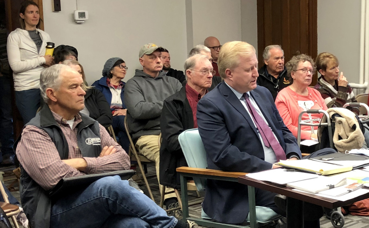 Deputy Secretary of State (elections division) Wayne Bena listened in, then spoke during Monday’s public hearing.