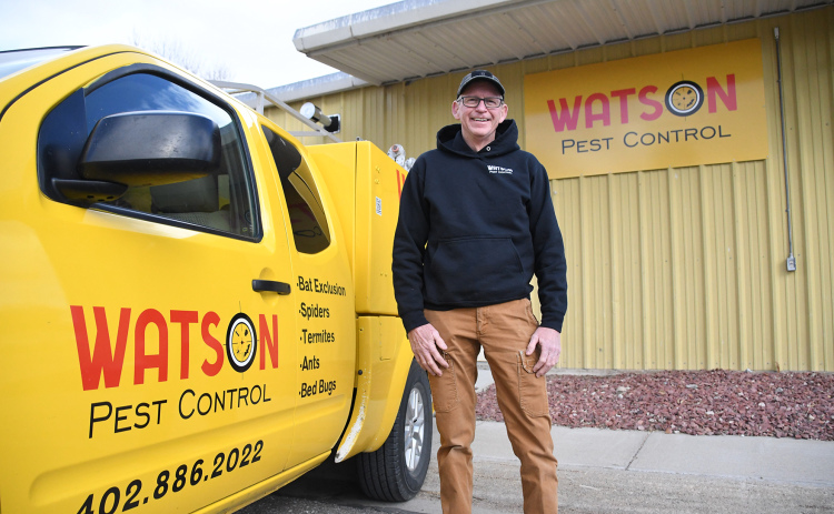Randy Watson stands outside the warehouse in Phillips that now bears the name of his new business, Watson Pest Control.