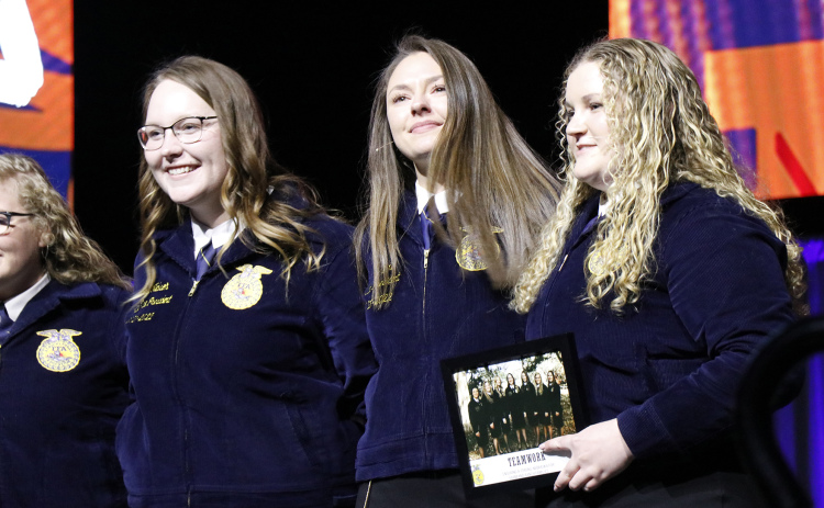A teary-eyed Ellie Wanek was thanked by her state officer team after completing her retiring address at the 94th annual Nebraska FFA State Convention.