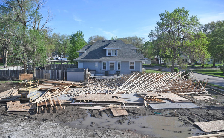 A home under construction on 8th Street was blown down by the storm Thursday.
