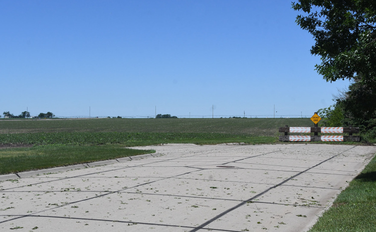 With B Street in the foreground and Highway 34 in the background, this photo shows a parcel of land on the west edge of Hampton that is planned for future housing/commercial development.