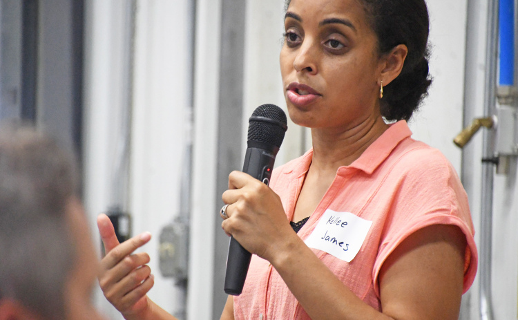 Mercaris C.E.O. Kellee James takes up the microphone, during Grain Place Food’s annual field day event, for a speech on the commodity market and its affects on the organic farm industry.