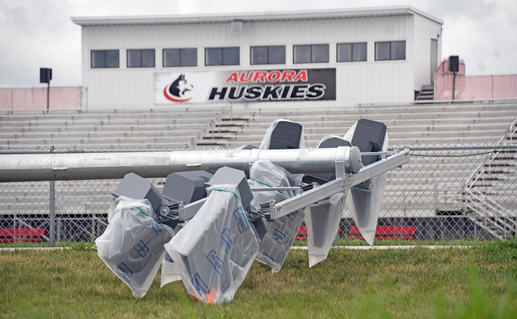 Aurora’s new stadium lights at the football field have been delivered and installed, but the 4R district is waiting for the lights’ control panel, a part of several supply chain issues for the school.
