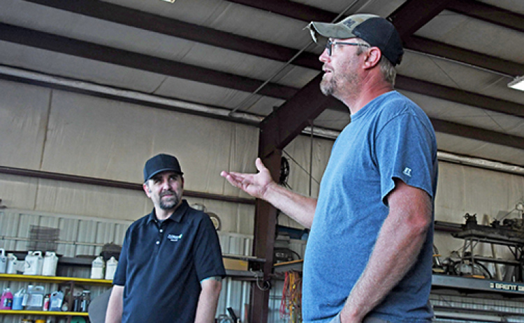 Heath Bish gives an answer at a Q&A on his farm west of Giltner. Bish was one of two farms visited by the Nebraska Soil Carbon Project for their kickoff event last week.