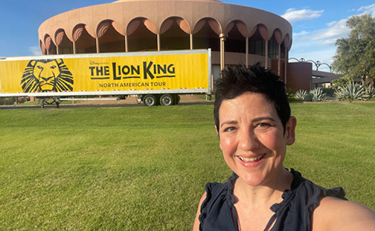 Top: Tereasa Payne takes a selfie in front of a Lion King theater production. Payne has done work fork for bands, orchestras and television but stated that theater offered her the most variety. Below: Payne plays on the pan flute at one of her performances.