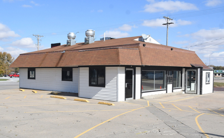 The former Chuck’s Drive-In building on Highway 34 in Aurora will soon be demolished, based on plans announced this week to build a new three-bay commercial structure in its place.