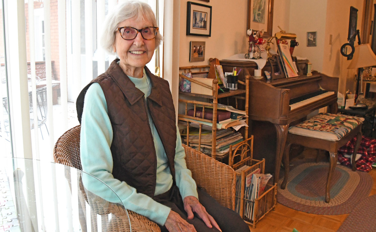 Shirley Barnell at her home in Aurora next to her piano and deck. Barnell lives in the same home as when she moved to the area in 1950.