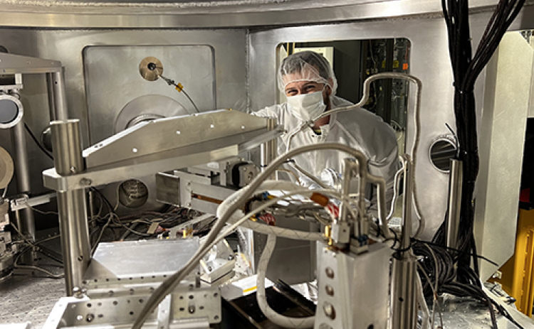 Dan Haden preps equipment for an experiment on the Linac Cohearant Light Source (LCLS) system at Standford University in Menlo Park, Calif., in May 2022. The Aurora native has been working with lasers to develop energy generation and other practical uses for the technology in his postdoctoral research at the University of Nevada in Reno.