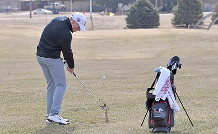 Aurora’s No. 1 Drew Knust was pinseeking on the par-4 sixth hole during his front nine action at Seward, eventually finishing seventh overall.