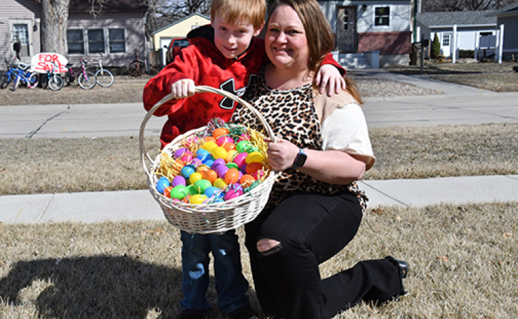 Eli and Amy Lewis show off their basket full of eggs ready for laying this upcoming Easter season. Eli is raising money for Aurora Adopt-A-Pet animal shelter to buy items on their Amazon wish list.