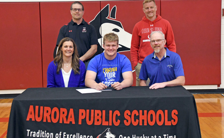 Aurora’s Jack Allen will continue his academic and wrestling careers at the University of Nebraska-Kearney, officially signed April 17 alongside his parents, John and Suzanne, as well as Aurora coaches Derek Keasling and Jeremy Dubas.