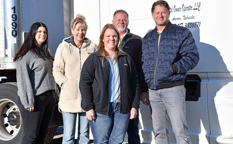 Amanda Senkbile, pictured front and center, became the first female to earn her Commercial Driver’s License through International Workforce Services. Pictured back from left are: Celie Holliday, Crystal, David and Todd Vettel.