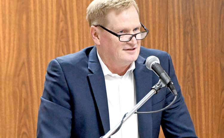 Aurora business owner and state Board of Education member Kirk Penner addresses those gathered for the annual National Day of Prayer Breakfast at the Leadership Center on Thursday morning.
