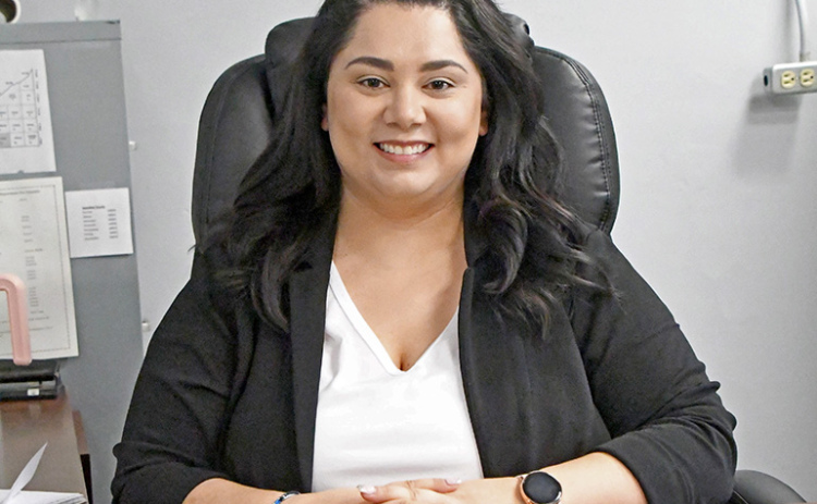 New Hamilton County Director of Planning and Zoning, Melissa Barry sits at her desk on the second floor of the courthouse. Berry has been working as a dispatcher for the county for nearly a year and took over her new position on May 10.