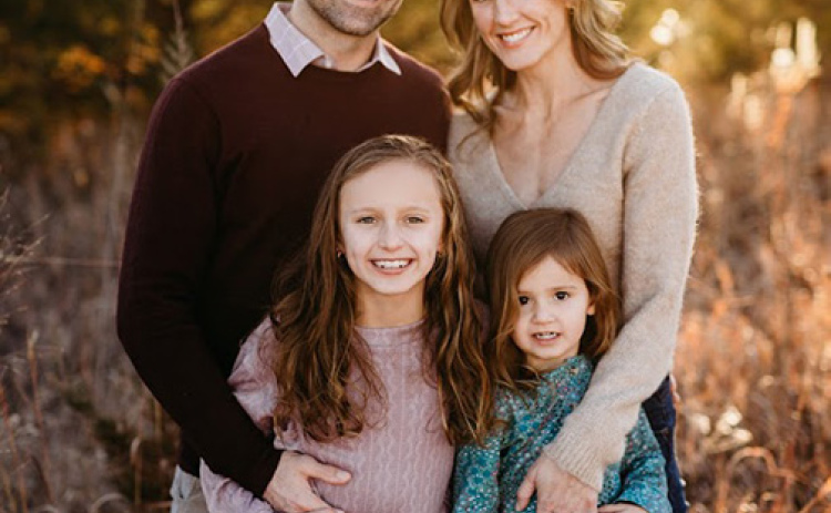 Kevin and Kayte Partch pose for a family photo with daughters, from left, Kendall and Kellan. The family lives in Lincoln where Kayte is the USDA Child Nutrition director for the Nebraska Board of Education.