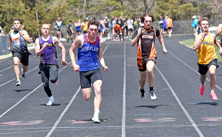 HPC’s Gavin Morris wins his 100 meter dash heat race at Saturday’s CRC meet at Osceola, flanked in either lane by Hampton’s Jack Bullis (left) and Giltner’s Blaydon White (right). Morris finished third in the 100 finals later in the afternoon.