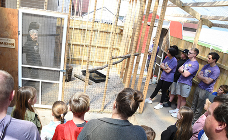 Edgerton Explorit Center personnel hosted its Go Big Give Eagles and Birdies event April 30, leading up to last week's main event. Pictured here, a group listens to facts about Altair from Deb Miller. This event marked the first time Altair was introduced to large groups, up to 28 people.
