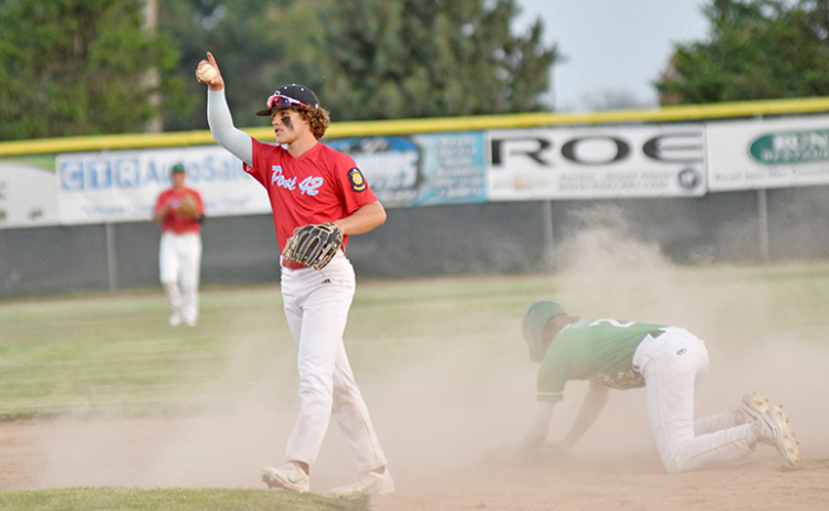 Aurora’s Chase Phillips points toward catcher Dylan Dubas after throwing out a baserunner at second base during an 8-7 win over Central City in the Pinnacle Bank Seniors’ home opener last week.