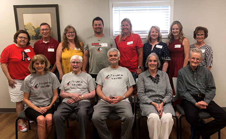 Several Eloe family members gathered with winners of the William and Delight Eloe Award Friday. Pictured front from left are Beth Eloe-Reep, Howard Eloe, Paul Eloe, Julie Taylor, Bill Eloe. Back row, from left, with the year they received the Eloe Award in parenthesis are: Laurie Anderson (2018), Doug Monson (2020), Karrie Wiarda (2014), Jason Frew (2017), Jessica Gallagher (2015), Amy Wilson (2016), Haley Sigler (2023), Maggie Rasmussen (2012). Eloe award recipients not pictured include Randy Maahs (2022),