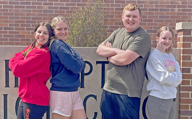 This team of Hampton Hawks won the Nebraska Stock Market Challenge, sponsored by Junior Achievement, and took third in the nationals earlier this month. From left are Shae Kingery, Sophia Schulze, Jacob Wishman and Kennedy McCullough.