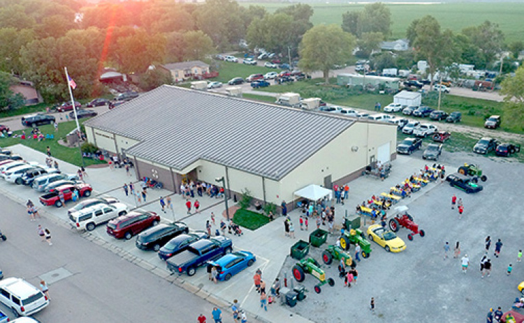 Phillips Memorial Hall, seen here at the community celebration on July 3, is being sold to the Phillips Community Foundation. The decision to sell the property and a nearby village storage building to the foundation was made at the July 11 meeting of the village board.