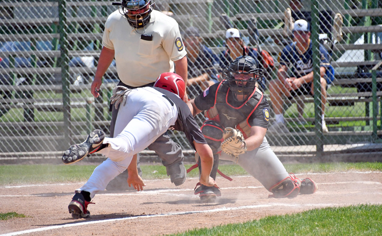 Dylan Dubas waits at the dish for an incoming Sutton baserunner for a crucial out during Aurora’s 8-1 loss Saturday to Sutton in the second round of the B5 area tournament played at Central City.