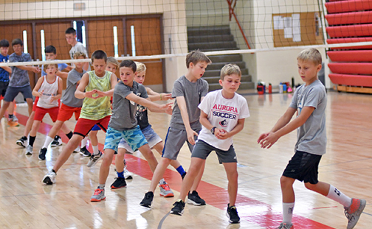Nearly 20 quarterback hopefuls participated in an Edgerton summer camp in conjunction with Aurora football's coaching staff.