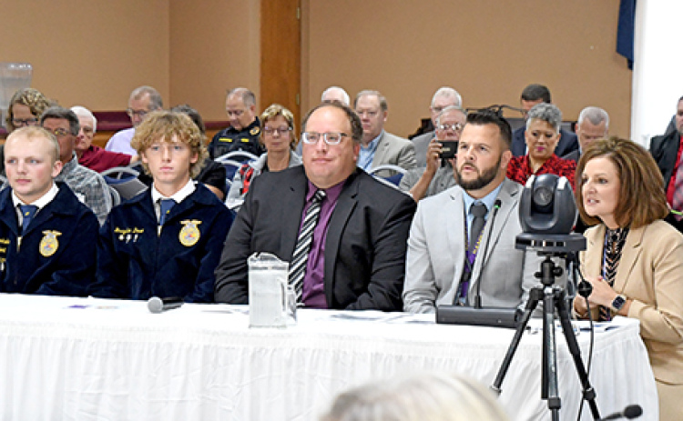 Hampton Public Schools made a presentation on the Hawk Herd program Friday to the Nebraska Department of Education Board during its meeting, a day after the board visited the school. Pictured from left are Evan Pankoke, Brayden Dose, ag teacher Joel Miller, Principal Carson Klute and Supt. Holly Herzberg.