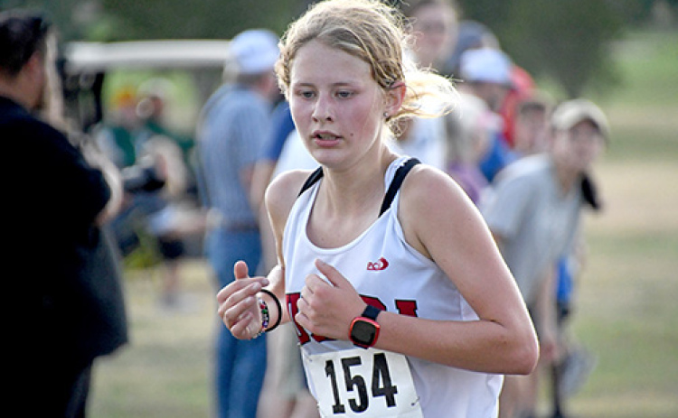 Aurora’s Kailey Dick earned her first medal of the season at Central City, finishing 14th with a new personal record time of 21:52.